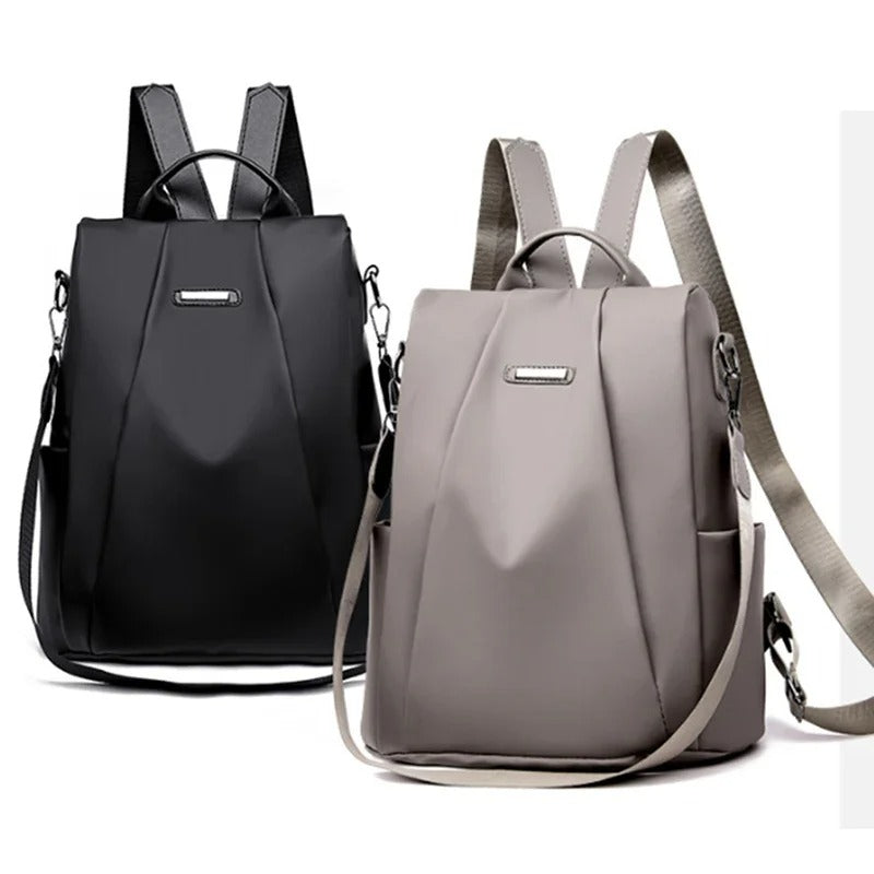 Comfortabele veelzijdige dames rugzak van waterafstotend nylon, te dragen als rugzak, schouder- of crossbodytas.