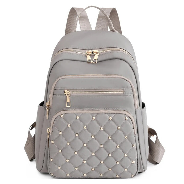 Nylon schooltas voor dames, lichtgewicht & waterafstotend, met organizer voor studenten & reizigers.