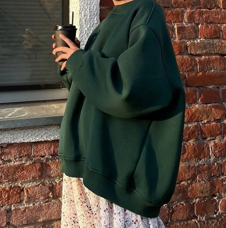 "Liv Oversized Sweater zwart - Zachte, ontspannen pasvorm, veelzijdig design, perfect voor elk seizoen, casual en stijlvol."
