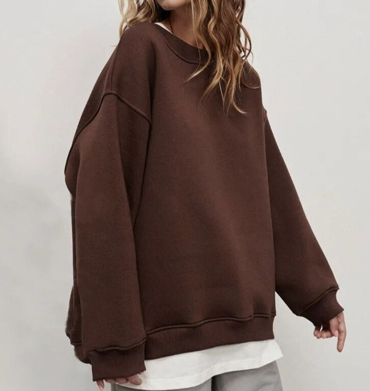 "Liv Oversized Sweater zwart - Zachte, ontspannen pasvorm, veelzijdig design, perfect voor elk seizoen, casual en stijlvol."