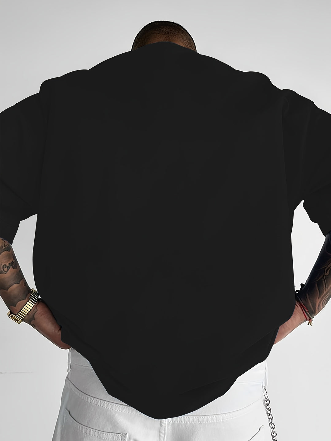 Opvallend heren t-shirt met slogan print en loose fit, perfect voor een moderne streetwear zomerlook.