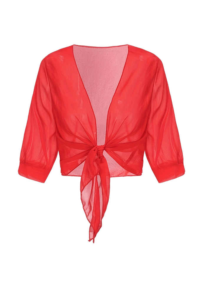 "Luchtige chiffon bolero met striksluiting en korte mouwen, elegant over zomeroutfits. Ideaal voor warme dagen en koele avond