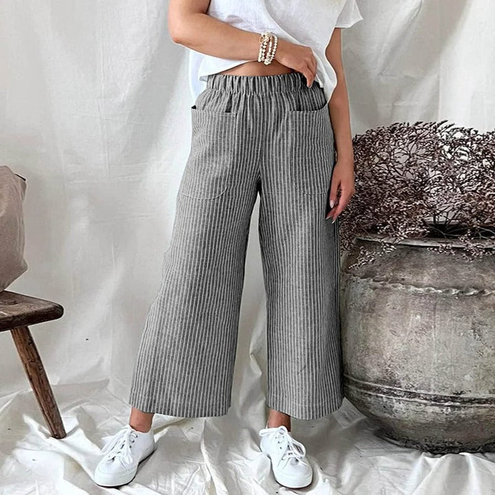 Zomerbroek dames met luchtige stof en diepe zakken, perfect voor een casual-chique lentelook.