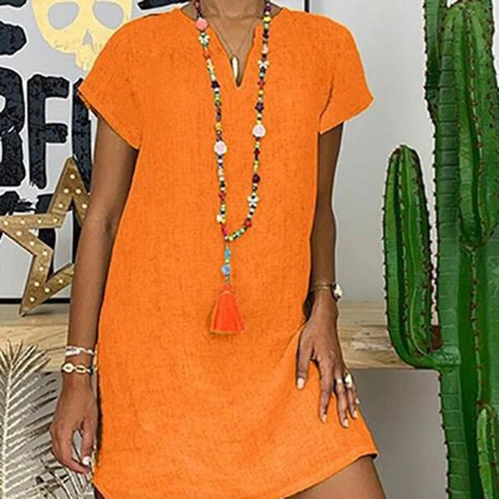 "Luchtige damesjurk van katoen en linnen, lichte zomerse stijl, ademend en comfortabel voor warme dagen."