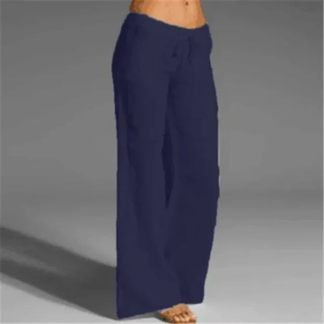Luchtige linnen damesbroek, beige kleur, met elastische tailleband en ademende stof voor zomerse elegantie en comfort.