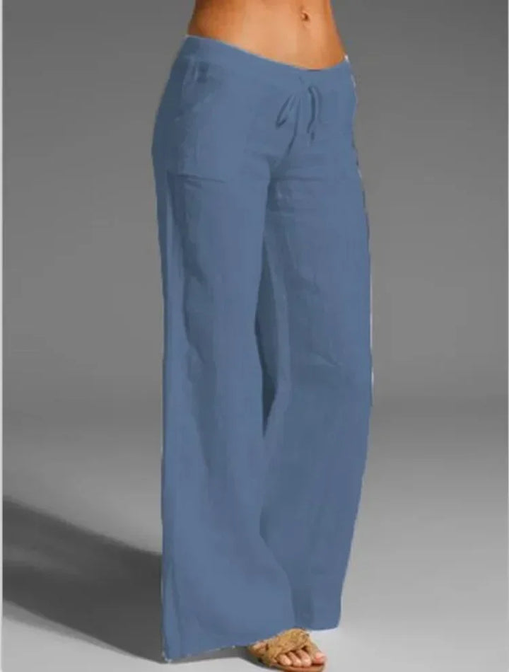 Luchtige linnen damesbroek, beige kleur, met elastische tailleband en ademende stof voor zomerse elegantie en comfort.