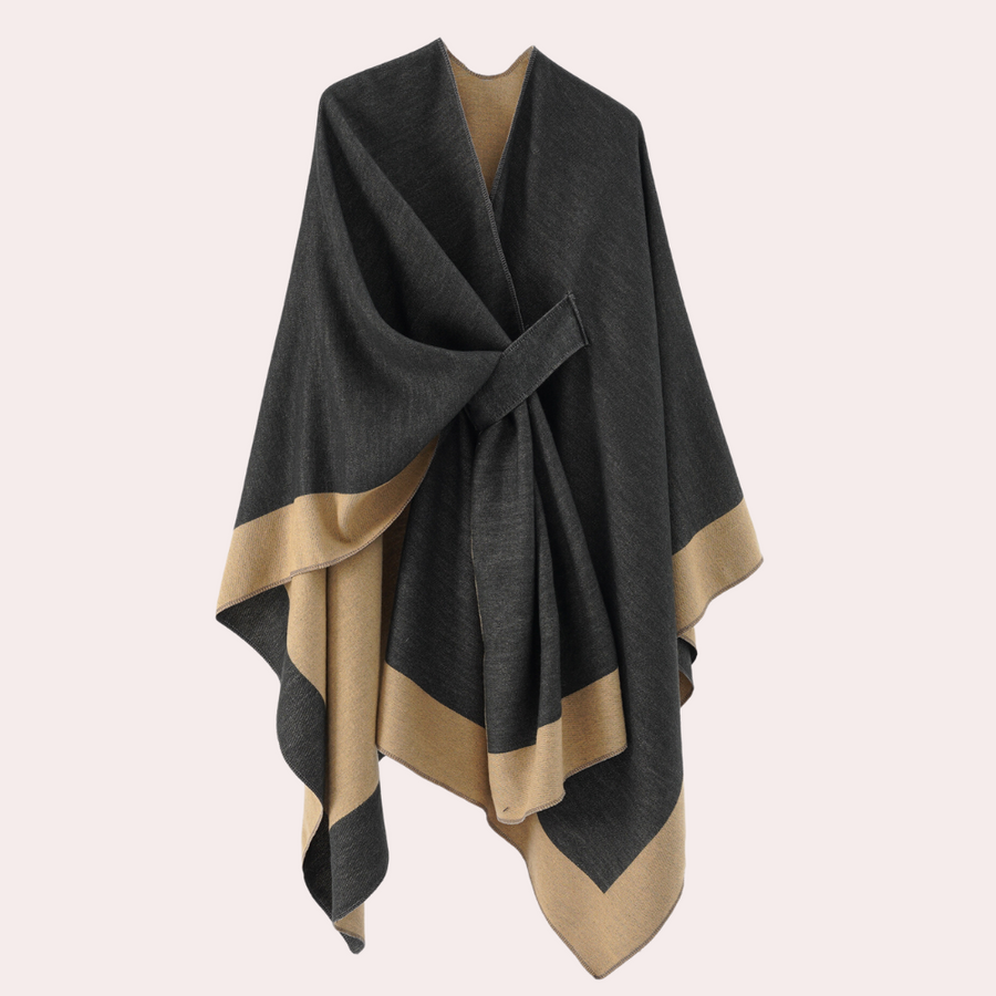 "Luxe dames poncho in klassieke kleur, zachte stof met riemdetail, veelzijdige pasvorm voor elegante en comfortabele uitstral
