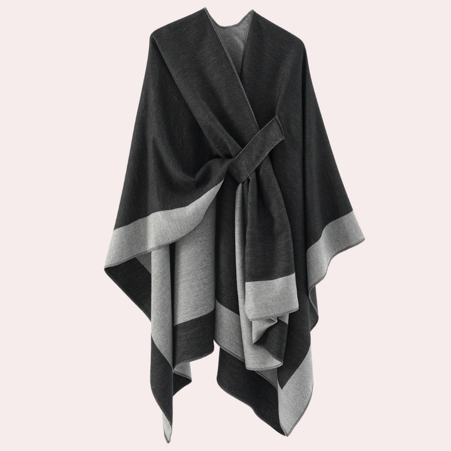 "Luxe dames poncho in klassieke kleur, zachte stof met riemdetail, veelzijdige pasvorm voor elegante en comfortabele uitstral