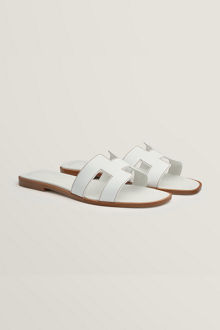 Elegante en comfortabele dames teenslippers, luxe platte zool, veelzijdig voor strand of stad.