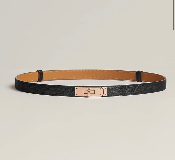 "Luxe damesriem van kunstleer, elegant design, verstelbare lengte, stijlvolle metalen gesp, zwart, bruin, taupe kleuren."