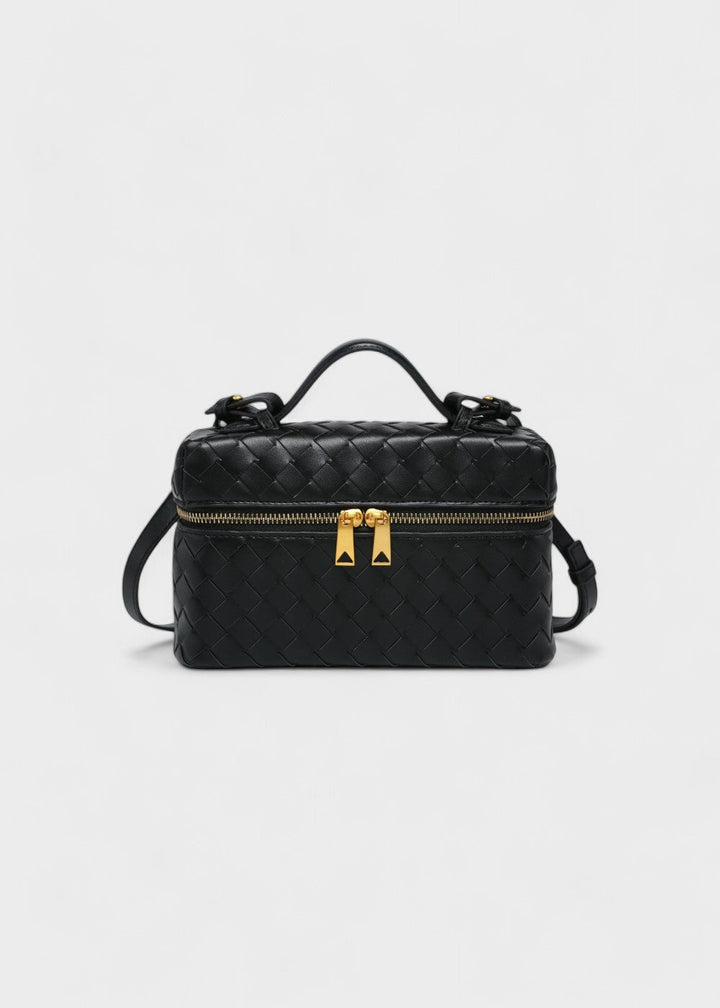 Luxe gevlochten damestas, stijlvol en veelzijdig. Perfect als elegante handtas of schoudertas voor dames.