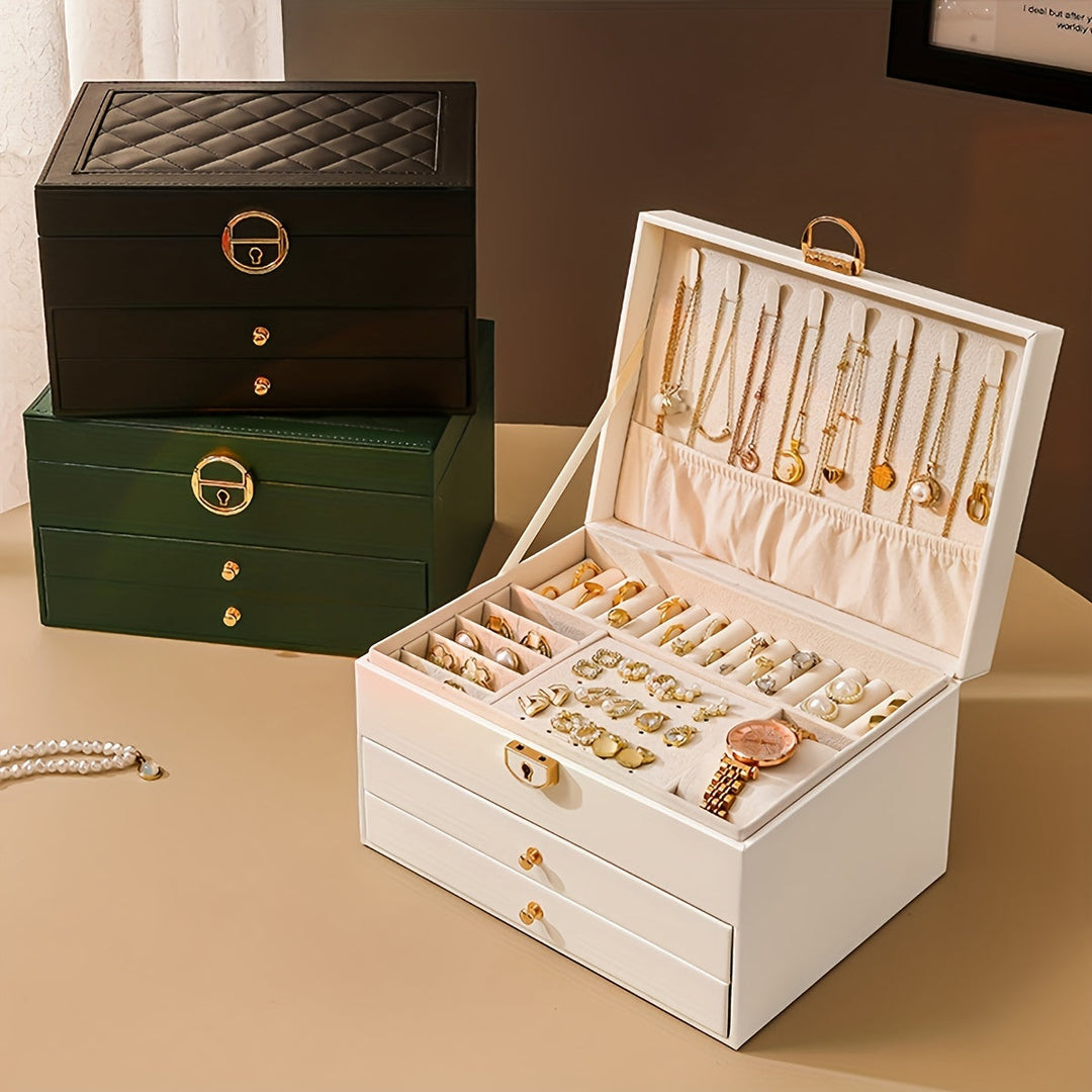 "Luxe sieradendoos van leer met meerdere vakken voor ringen, kettingen en armbanden, elegant en duurzaam design."