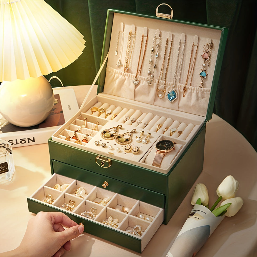 "Luxe sieradendoos van leer met meerdere vakken voor ringen, kettingen en armbanden, elegant en duurzaam design."