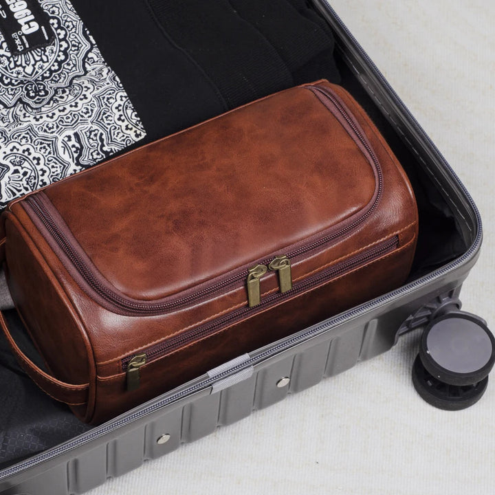 Zwarte luxe Voyago reistoilettas, stijlvolle organizer voor verzorgingsproducten, perfect voor onderweg.