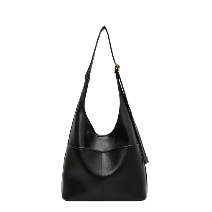 "Luxe vrouwen leren tas, grote voorzijde, elegant design, hoogwaardig zwart leer, ruime tas voor dagelijks gebruik."