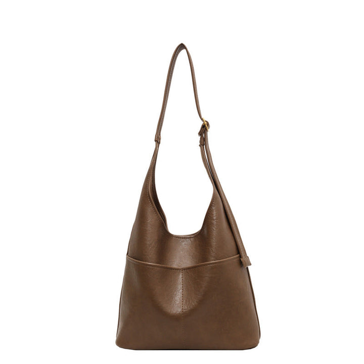 "Luxe vrouwen leren tas, grote voorzijde, elegant design, hoogwaardig zwart leer, ruime tas voor dagelijks gebruik."