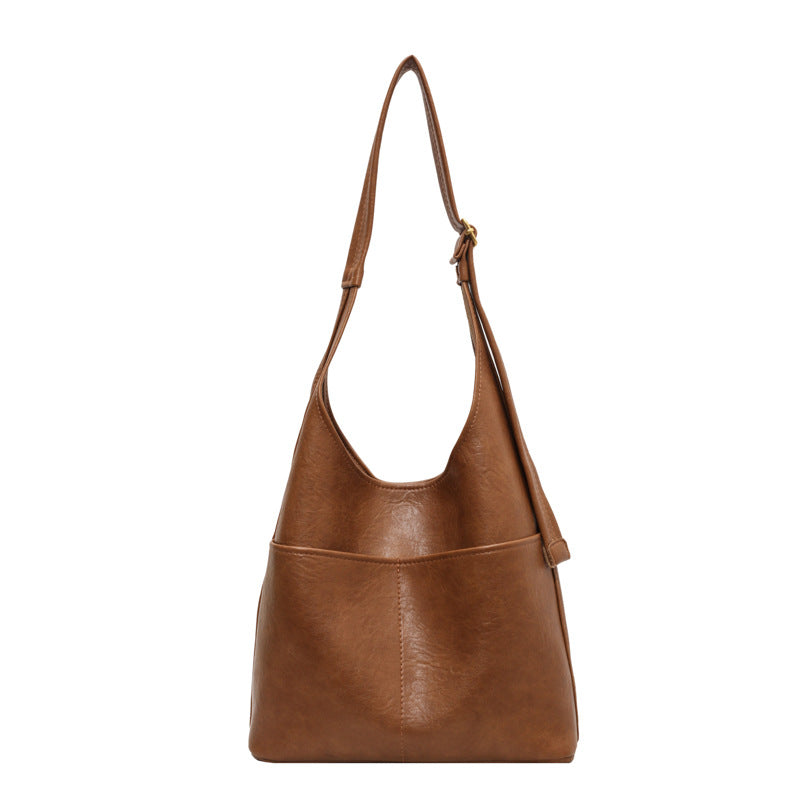 "Luxe vrouwen leren tas, grote voorzijde, elegant design, hoogwaardig zwart leer, ruime tas voor dagelijks gebruik."