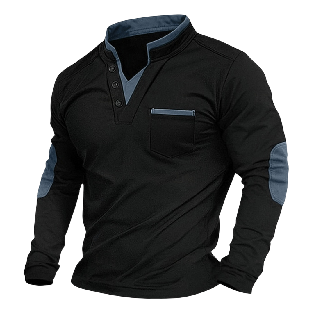 Close-up van de contrasterende elleboogpatches op dit stijlvolle heren V-hals sweatshirt. Casual en chic.
