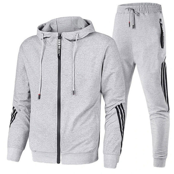 Comfortabel heren hoodie en joggingbroek pak voor herfst en winter. Geschikt voor sport en casual draagcomfort.