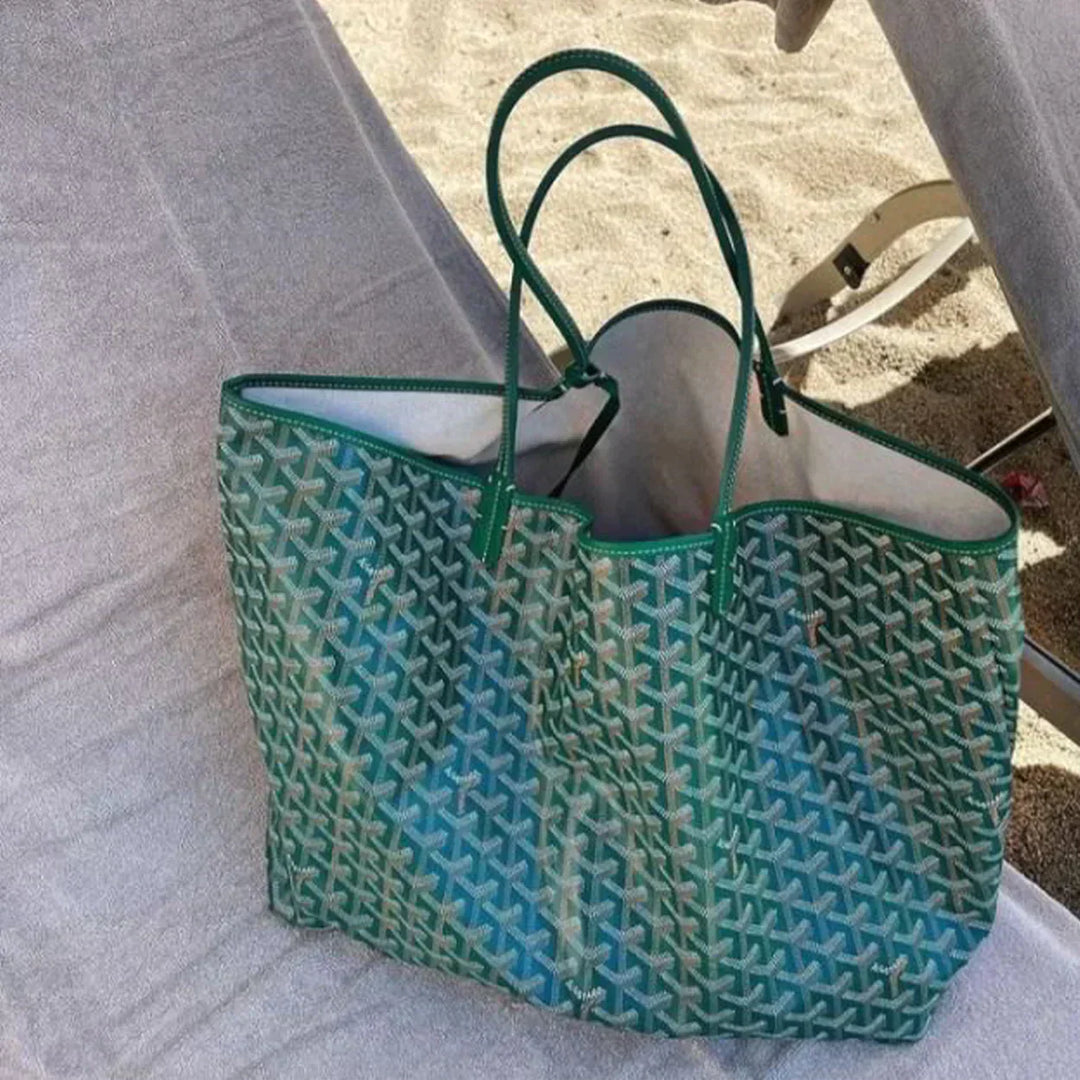 Elegante dames tas met gestructureerd design, een modieuze en veelzijdige schoudertas.
