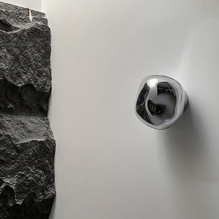 Design wandlamp van glas, perfecte sfeerverlichting voor eigentijdse interieurs.