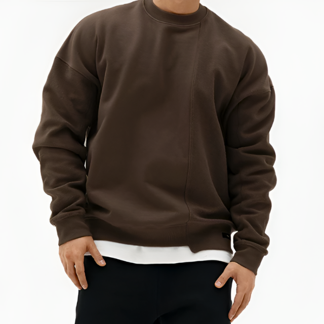 Moderne heren sweater met asymmetrische naad, ronde hals en comfortabele oversized pasvorm voor winterse casual stijl.