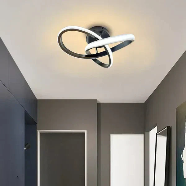 Moderne LED plafondlamp met dubbele ring, strak design voor woonkamerverlichting.