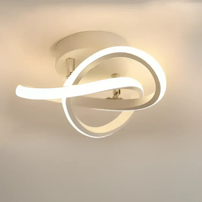 Decoratieve LED plafondlamp, modern en strak design, ideaal voor sfeervolle verlichting.