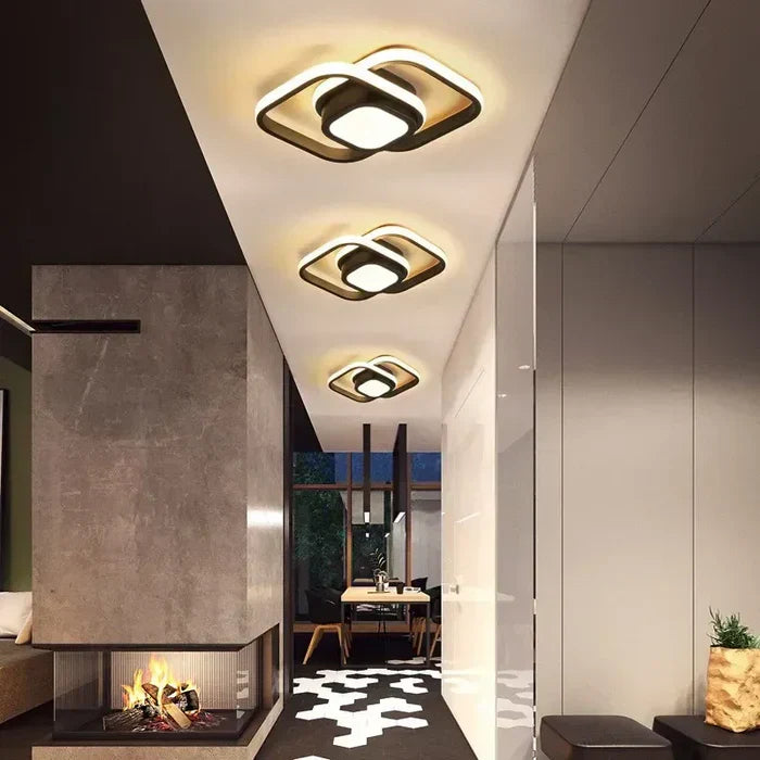 Plafondlamp met LED-technologie en uniek dubbel ring design; perfect voor slaapkamer.