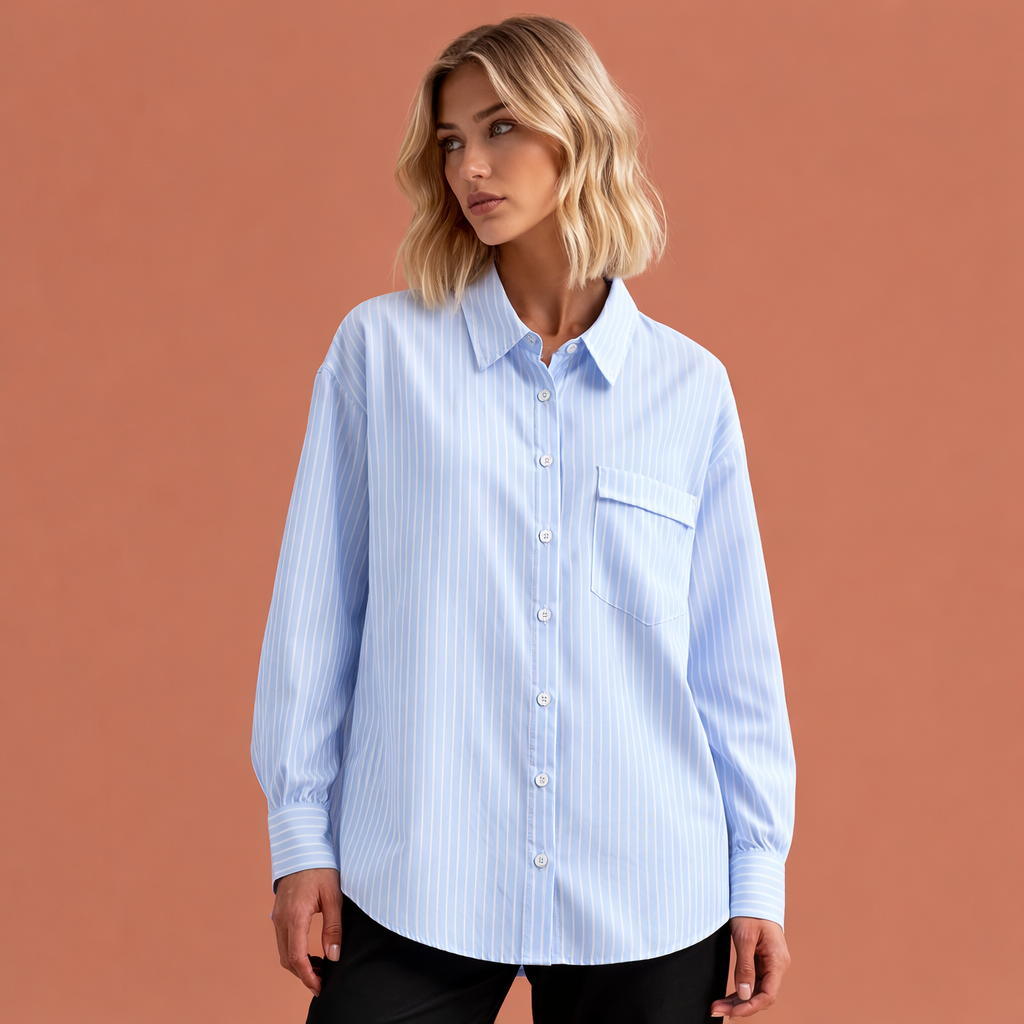 Dameskleding: trendy gestreepte oversized blouse, modieus en comfortabel voor een relaxte maar stijlvolle look.