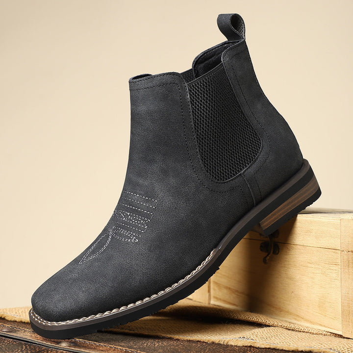 Comfortabele bruine heren Chelsea boots met unieke westernstijl stiksels, ideaal voor een smart-casual look.