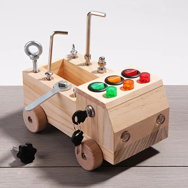 Montessori activiteitenbord met knopjes, schuifjes en een klikker voor urenlang leerzaam speelplezier en motorische training.