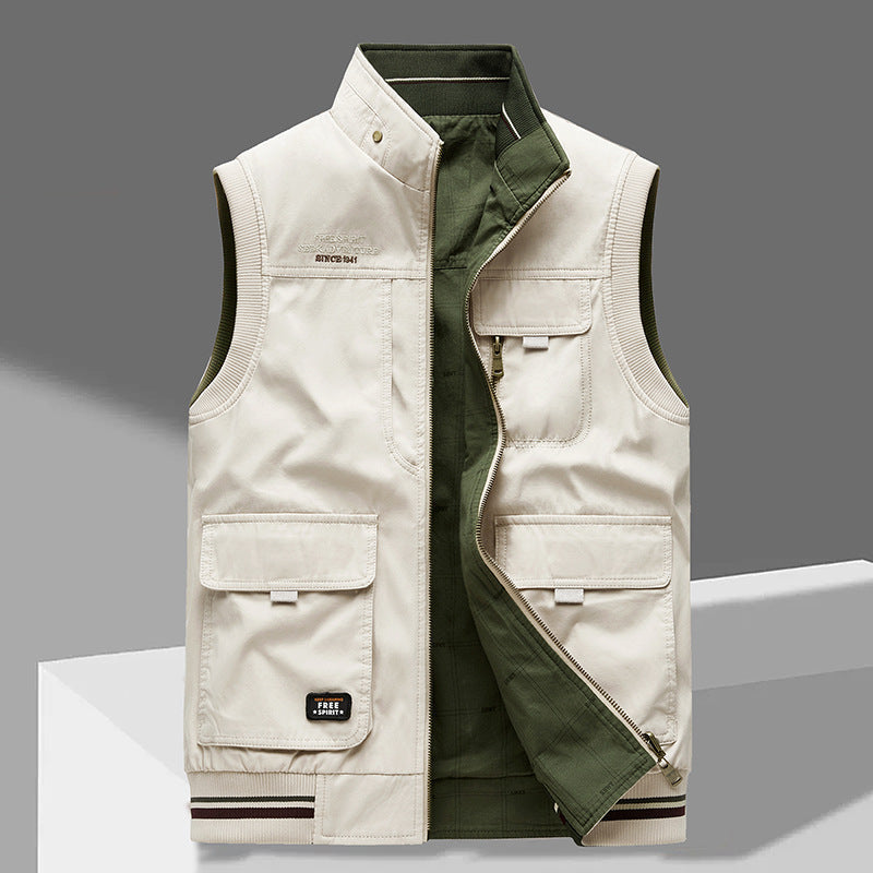 Mouwloos heren utilityvest, omkeerbaar met rits en vele praktische zakken, ideaal voor lente/herfst casual look.