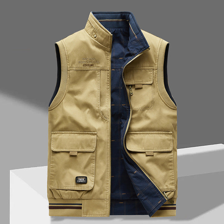 Praktisch heren utilityvest met rits, omkeerbaar design. Veelzijdige mouwloze buitenkleding voor lente en herfst.