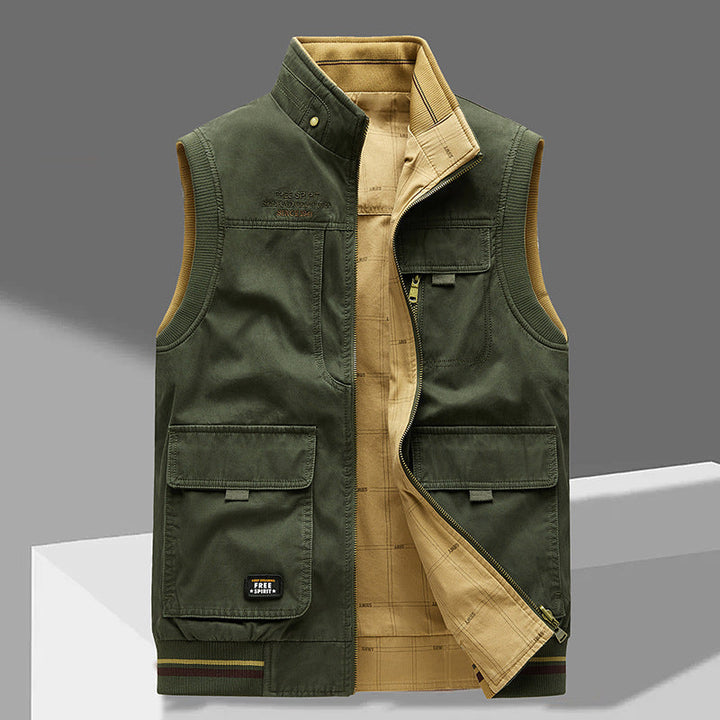 Stijlvol heren utilityvest, reversible met rits en ruime zakken. Perfect voor casual look in lente en herfst.