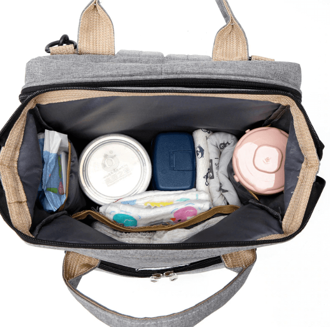 Duurzame, waterdichte reisrugzak en luiertas met geïntegreerd babybed voor zorgeloos reizen.