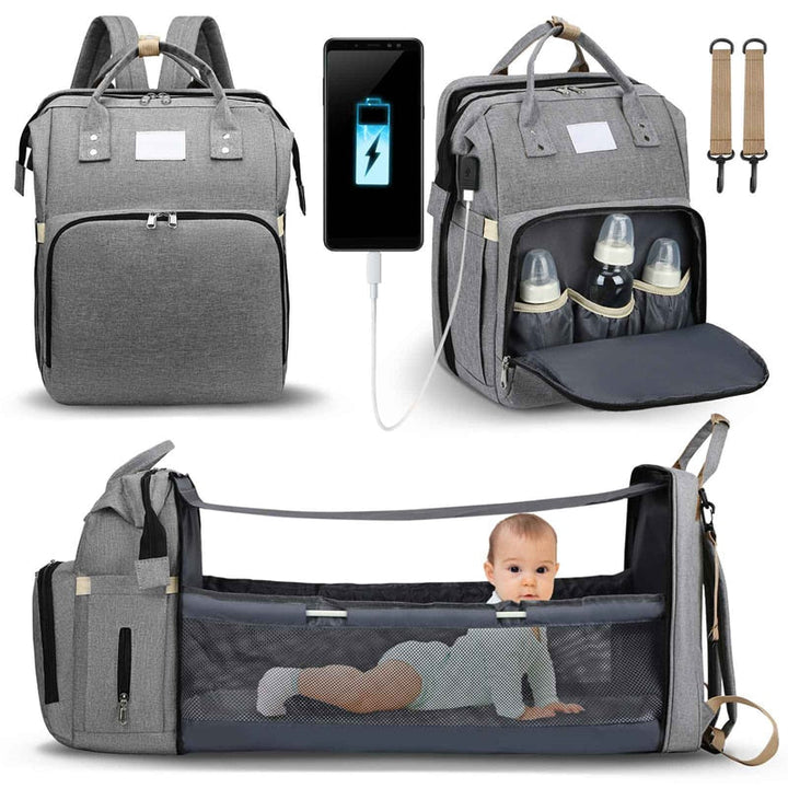 Georganiseerde luiertas rugzak met opvouwbaar babybed, perfect voor al je babyuitzet onderweg.