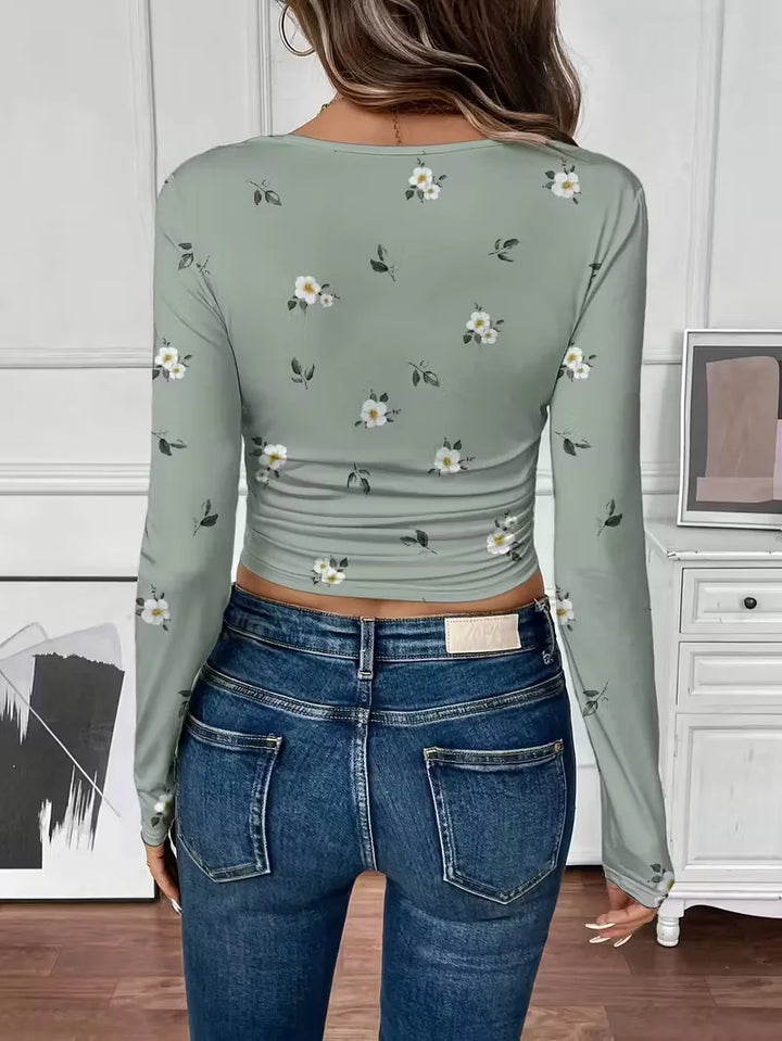 Comfortabele olijfgroene dames longsleeve met trendy bloemenprint en ronde hals; ideale regular fit top.
