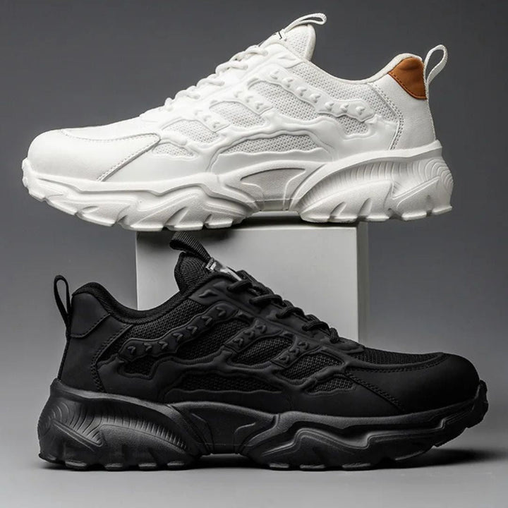 "Onverwoestbare zwarte werksneakers met stalen neus, anti-plet, flexibele zool, ideaal voor bescherming en comfort."