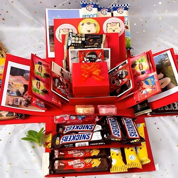 Open verrassings explosiebox met vliegende vlinders, ideaal als uniek cadeau voor verjaardag of jubileum.