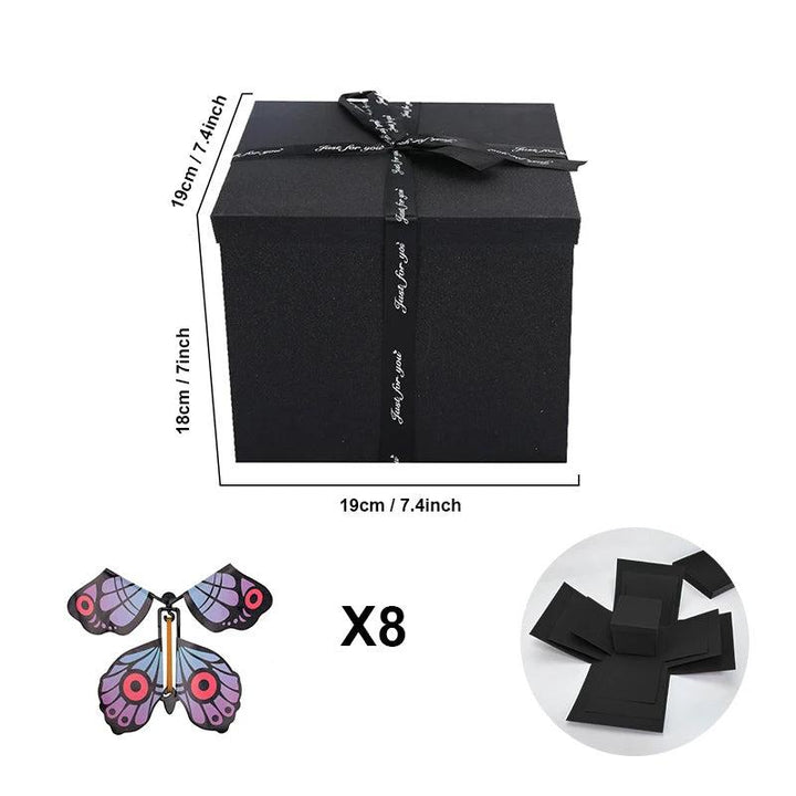 Explosiebox met vliegende vlinders en kleine cadeautjes binnenin, een complete verrassing voor elke feestdag.