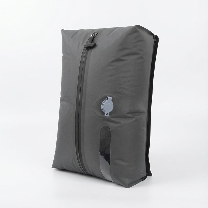 Georganiseerde bagage met SpaceSwell compressietassen. Efficiënte ruimtebesparing in koffer, perfect voor elke vakantie.