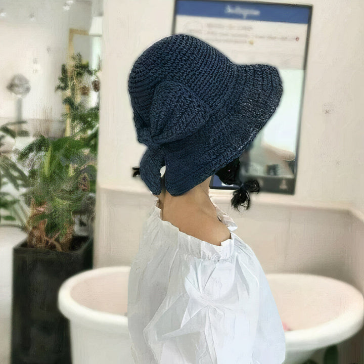 Opvouwbare dames zomerhoed met strik, stijlvol accessoire, zacht en milieuvriendelijk.