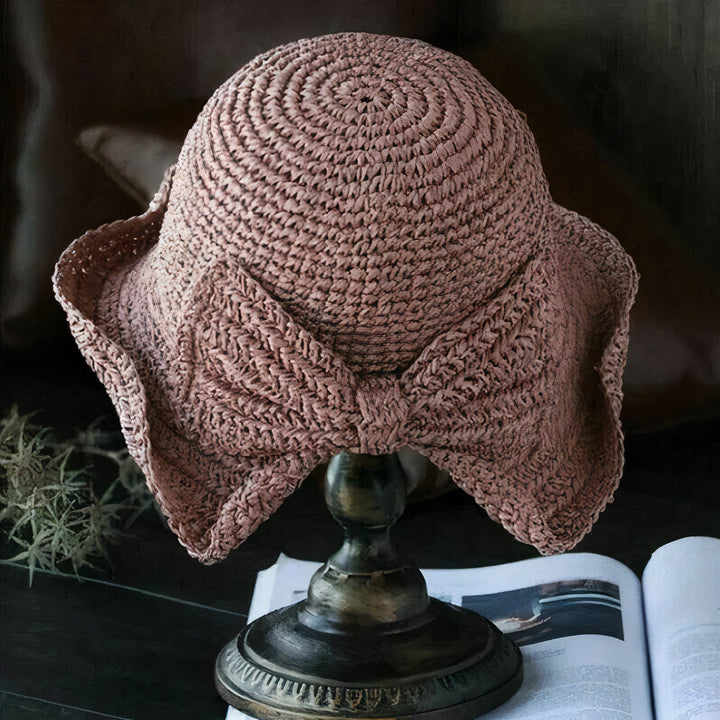 Opvouwbare dames zomerhoed met strik, stijlvol accessoire, zacht en milieuvriendelijk.
