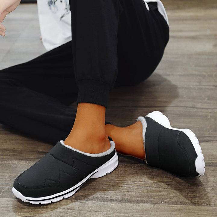 Orthopedische herensloffen met zachte grijze voering en antislipzool, perfect voor herfst en winter comfort en stijl.