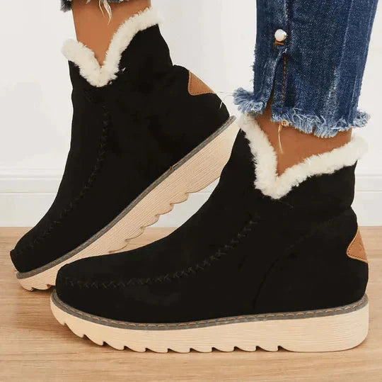 Lichtgrijze dames orthopedische warme winterschoenen, voorzien van veters, comfortabel en modieus voor koud weer.