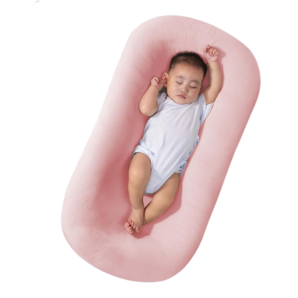 "Pastel baby lounger kussen van zacht katoen, veilige nest voor baby's 0-24 maanden, ademend en ergonomisch ontwerp."