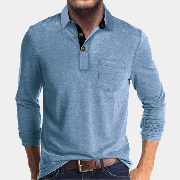 Poloshirt heren in blauw, elegante pasvorm, hoogwaardige stoffen, biedt comfort en stijl. Geschikt voor formele gelegenheden.