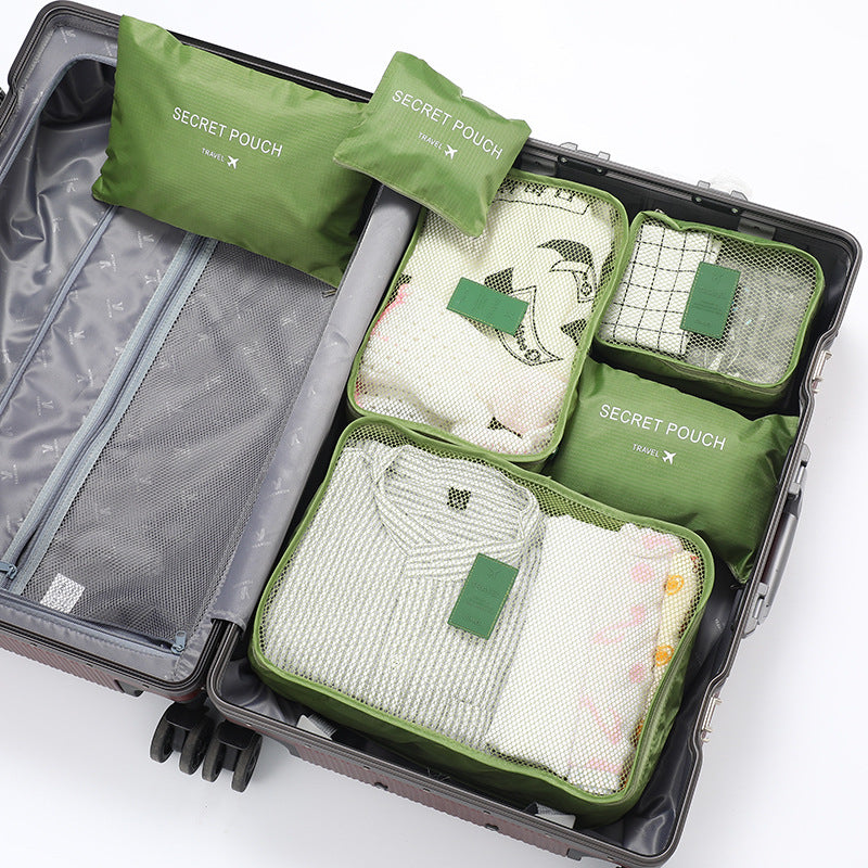 Praktische inpakcubes set voor het efficiënt opbergen van kleding en spullen in je reistas of koffer.