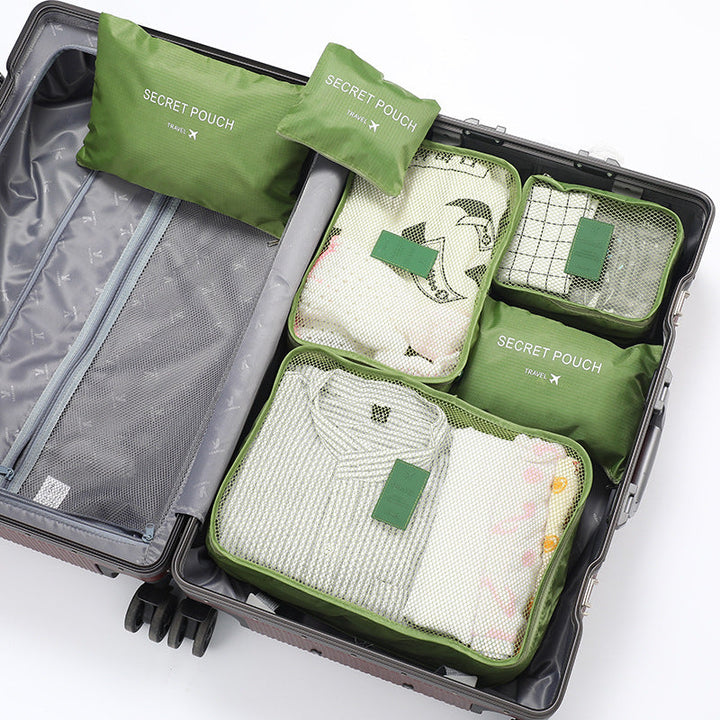 Praktische inpakcubes set voor het efficiënt opbergen van kleding en spullen in je reistas of koffer.